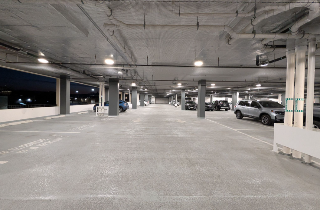 Commercial parking garage fitted with nets for birds to maintain cleanliness and safety